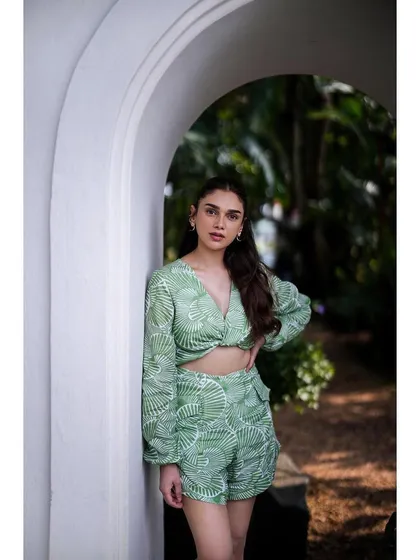 A full-length view of the green printed Summer Somewhere set, showing the cute crop top and matching shorts.