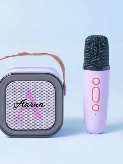 Turn up the volume with our personalised karaoke speakers. This one is customised with a name and initial in a pretty lavender color.