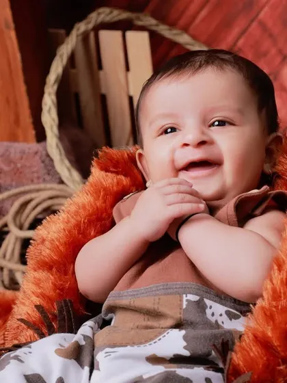 A heart-melting smile from the cutest cowboy in the West. The warm, earthy tones of this set create a cozy and charming atmosphere.