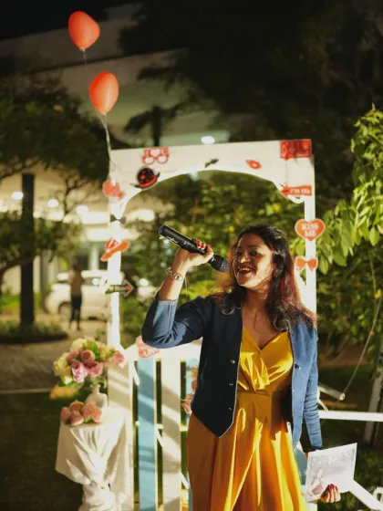 As an anchor, I believe in the value I bring to an event. This photo captures me in my element during a Valentine's Day party, confident and ready to create a memorable experience.