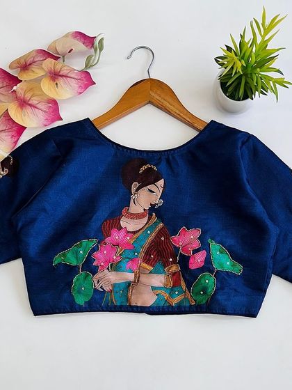 The printed pure silk blouse in a classic navy blue.