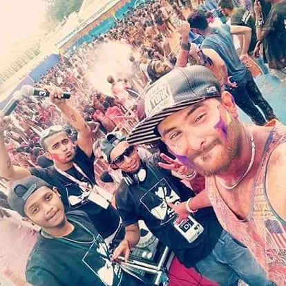 A quick selfie with the crew and the massive crowd behind us during a Holi festival. Connecting with the audience is a huge part of what makes these large scale events so special.