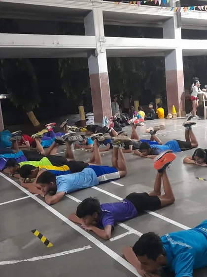 Athletes working on glute activation exercises, a critical part of our prehab and strength program to power athletic movements.