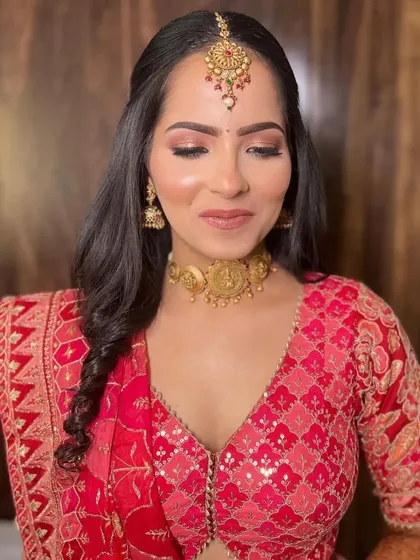 A beautiful look for a Godh Bharai (baby shower). The makeup is soft, glowing, and celebratory, designed to make the mom-to-be feel special and look radiant on her important day.