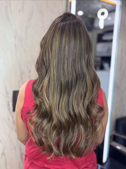 Another angle of the Beige Biscoff hair, highlighting the seamless blend of warm and cool tones.