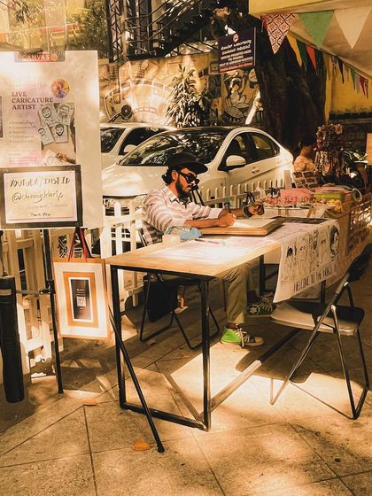 A wider view of my pop-up stall on a sunny day. My setup is mobile and can fit into any event space, indoors or outdoors.
