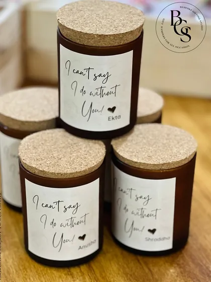 "I can't say I do without you!" These personalized scented candles are a warm and heartfelt way to ask your closest friends to be by your side. Each candle features a custom label with their name.