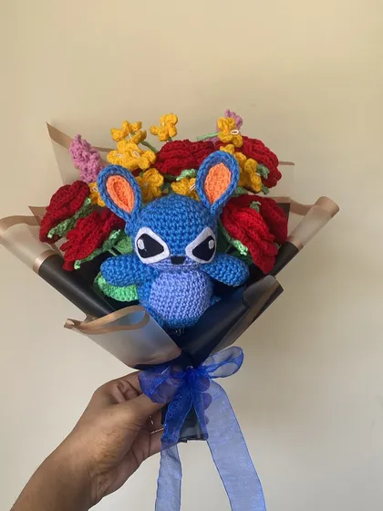 Here is a custom bouquet I made featuring Stitch. I love combining beloved characters with my forever flowers to create a gift that is personal, unique, and will never wilt.