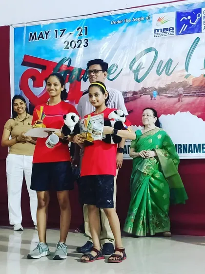 Aditi Yadav and her partner Pranjal Dedhia receiving their U13 Doubles winner trophies at the Maharashtra State Open 2023.