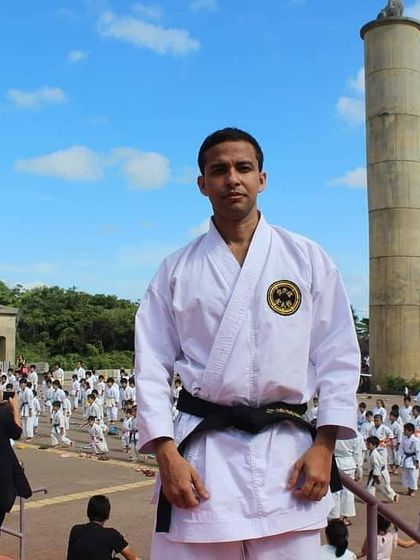 Standing at a Karate Day event in Okinawa. These gatherings bring together practitioners from all over the world to celebrate and share our art.