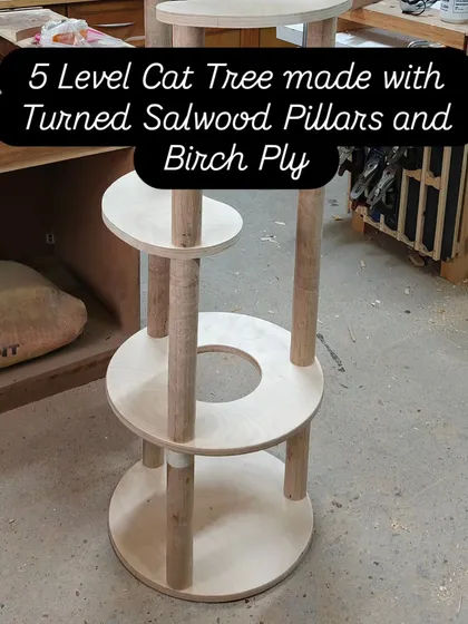 For the discerning feline, a 5-level cat tree built with sturdy turned Salwood pillars and smooth Birch plywood. This isn't just cat furniture; it's a custom-designed play-and-relax tower made to last.