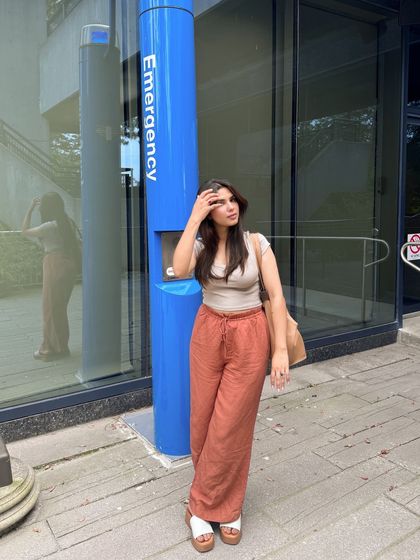 A thoughtful, looking-away pose from the same series.