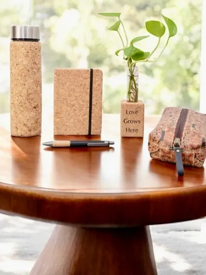 Gifting responsibly is important to me. This eco-chic set, featuring a cork-wrapped flask, notebook, and pen, is part of my sustainable collection, perfect for environmentally conscious brands.