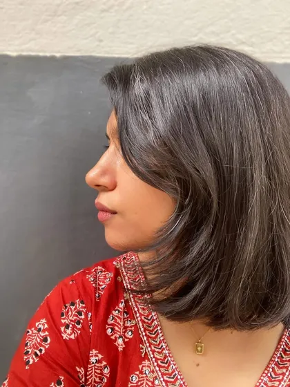 A classic bob haircut for a client ready to go back to short hair. This wash-and-go style is perfect for happy hair days and easy maintenance.
