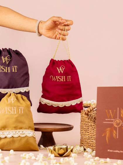 A closer look at our "Thamboolam Tales" potlis. These modern wedding favors are designed to be both beautiful and useful, filled with goodies your guests will actually enjoy.