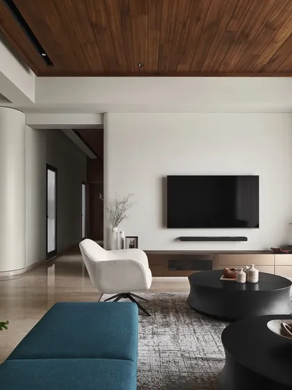 The "Forge" TV unit, finished in bronze metallic glass, is a favorite piece of mine. It marries practicality with a strong aesthetic, commanding attention with its understated strength without overpowering the living room's calm atmosphere.