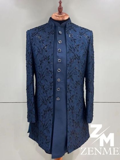A full view of the blue and black floral embroidered Indo-Western. The layered look with the inner kurta creates a sophisticated and regal silhouette.