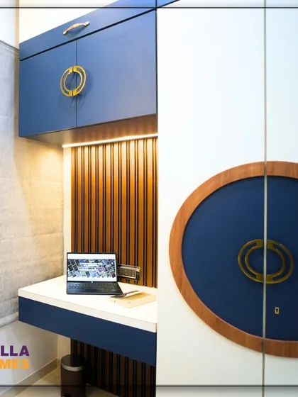 Details from a space-saving kids' room, showing the custom wardrobe with unique circular wooden and blue handles and an integrated study desk.