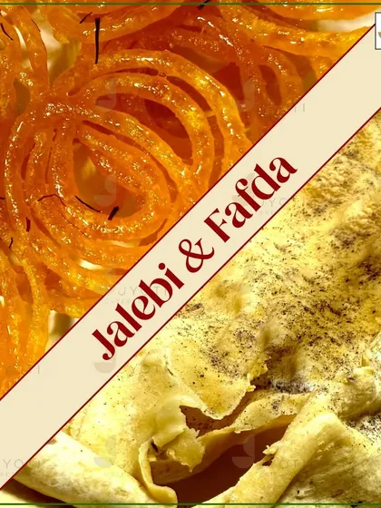 The timeless Gujarati pairing of Jalebi and Fafda. The sweet, syrupy jalebi perfectly complements the savory, crispy fafda for a delicious breakfast or snack.
