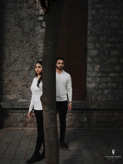 A creative pre-wedding portrait using a tree to frame the couple. I love finding unique compositions to make your pre-wedding photos stand out.