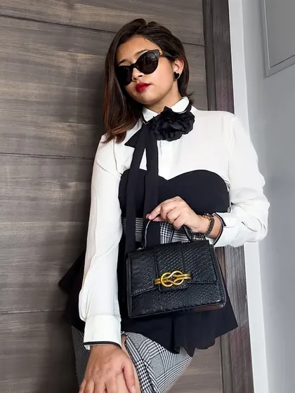 Feeling formal on a Saturday. This monochromatic look with a white shirt, black peplum top, and checkered trousers is my take on the 'office siren' aesthetic. It's sharp, chic, and powerful.