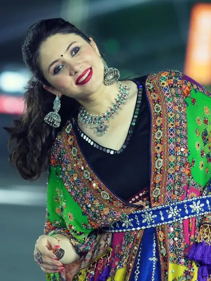 A close-up of my Day 6 look, showing the detailed makeup and colorful outfit.
