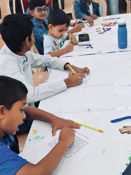 It's not all just building. We mix in fun, brain-teasing activities like these LEGO-themed maze challenges to keep minds sharp and engaged throughout the workshop.