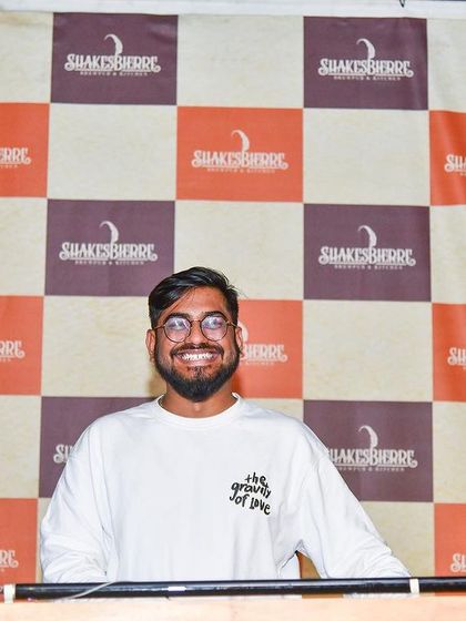 Posing for a quick photo before my set at Shakesbierre. Ready to spin a mix of Top 40, Bollywood, and Punjabi music for the weekend crowd.