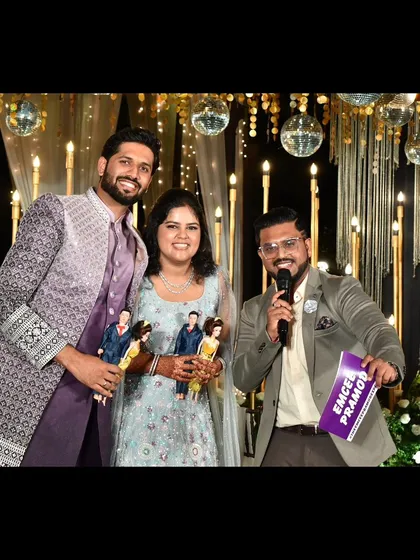 The smiles say it all! Posing with the happy couple after a fantastic Sangeet night. My goal is to make the couple feel like the stars of the show, creating memories they'll cherish forever.