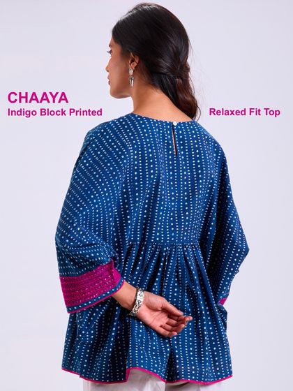 The back of our Chaaya relaxed fit top, showing the simple closure and the beautiful drape of the hand-block printed cotton. Easy, breezy, and made with care.