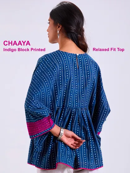 The back of our Chaaya relaxed fit top, showing the simple closure and the beautiful drape of the hand-block printed cotton. Easy, breezy, and made with care.