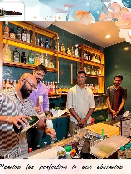 Pouring the celebration! Our team celebrating the "Best Bartenders of the Year" award.
