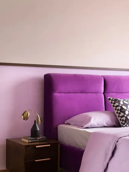 A duplicate of 242, showing the purple headboard.
