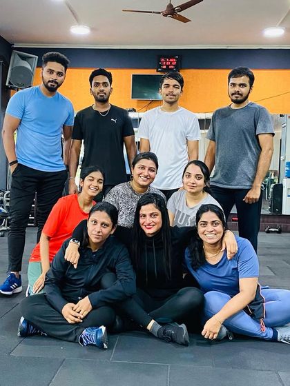 The team huddling up after class. The camaraderie is what makes us unique.