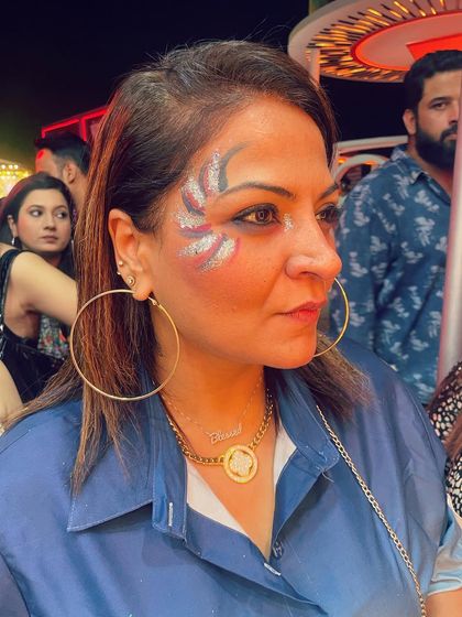 An abstract wing design using red, white, and blue glitter. This patriotic-colored design is bold and graphic.