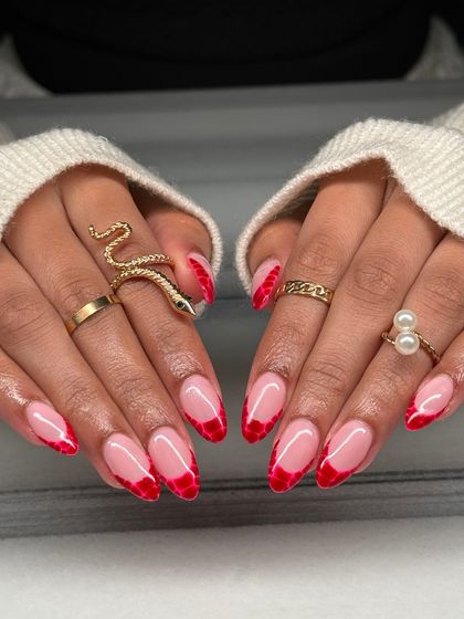 A fierce and fiery French manicure. I used a vibrant red with a subtle crocodile skin texture for the tips, giving this classic look a wild and trendy update.