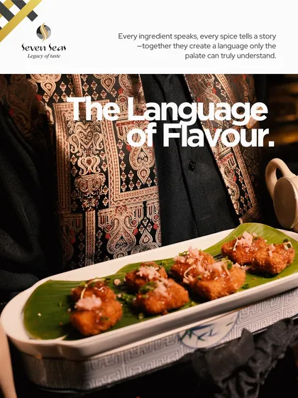 The Language of Flavour. Four perfectly fried morsels are arranged on a banana leaf, each telling a story of spice and texture that the palate can truly understand.