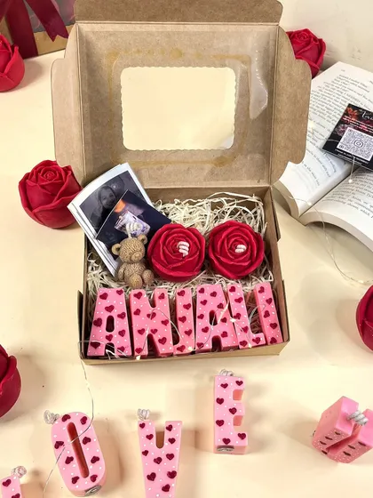 Here is the 'Spell & Shine' gift box, ready to be personalized with any name. It's a complete package with candles and memories, perfect for gifting.