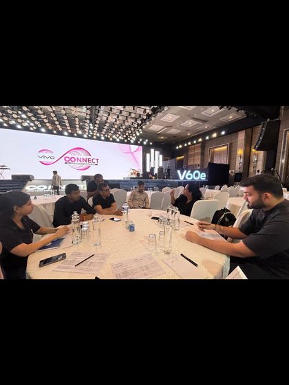 A pre-event briefing with the entire crew for the VIVO V60e Conclave. We ensure every team member is aligned on the day's schedule and responsibilities.