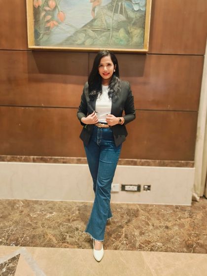 A casual, confident look. Fitness is about feeling good in any outfit, whether it's a dress or jeans.