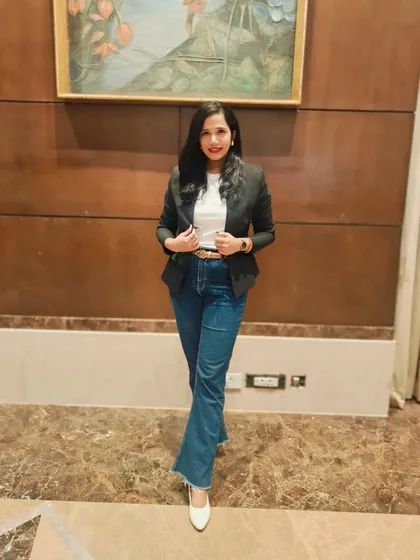 A casual, confident look. Fitness is about feeling good in any outfit, whether it's a dress or jeans.