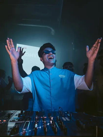 These nights are what make it all worth it. A shot of me with hands up, feeling the music and the crowd's energy.