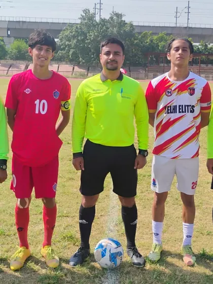 Captains shake hands with the officials before a U-19 HCL Youth League match.