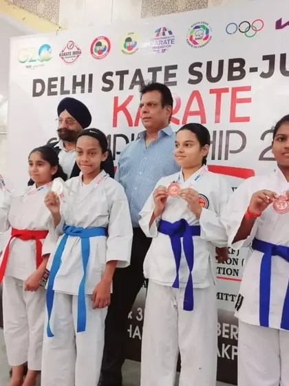 My students displaying their medals after a successful day at the Delhi State Sub-Junior Karate Championship. For many, it was a great learning experience, and I encourage them all to keep training and never give up.