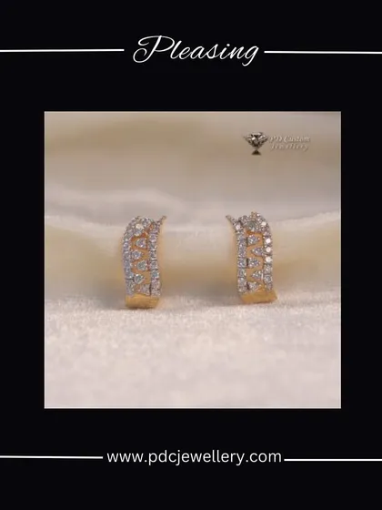 A pleasing pair of 18kt gold and diamond hoop earrings. The simple yet stylish design makes them a versatile accessory for both casual and formal outfits.