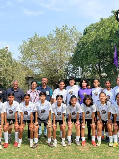 Our women's team, playing for the Diana Jones Foundation, posing for a group photo after securing two incredible victories at the JMF Pink Cup.
