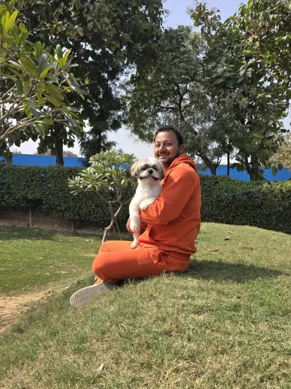 A happy, smiling dog is the best feedback I can get. This photo captures the trusting relationship I build with each bachha that stays with me.