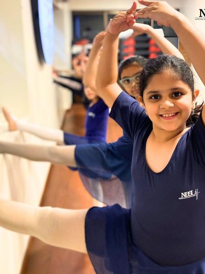 At NBSI, we don't just dance, we own every step. Join for the elegance, stay for the confidence glow-up.