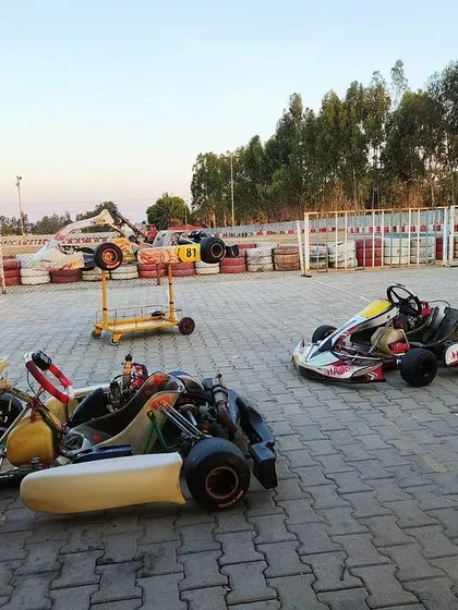 A duplicate shot of karts in the paddock.