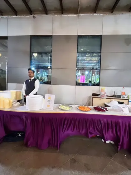 A salad and plate counter set up for a wedding of 550 people in Vikhroli. I ensure all parts of the meal are well organized.